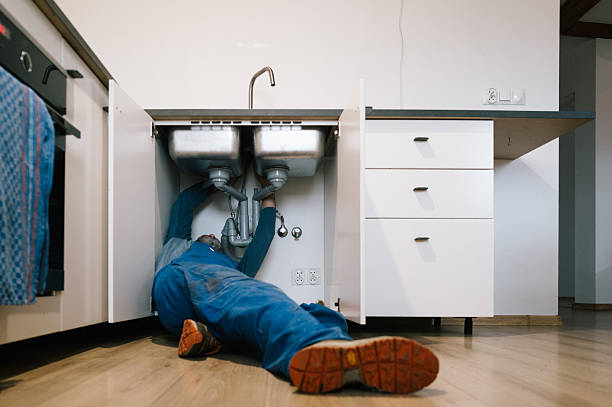 Professional Plumbing technician working in Mc Intyre, PA